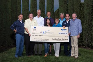 Constellation Brands’ Senior Vice President of Corporate Affairs, Jim Ryan (second from left), and Howard Young (third from left), President of General Wholesale Beer Company in Atlanta, Ga., presented a check in the amount of $1,000,000 to members of the board of directors from The V Foundation for Cancer Research. Featured in the photo are Chief Executive Officer of The V Foundation, Susan Braun (third from right), and Mike Krzyzewski (second from right), head coach of the Duke Blue Devils men's basketball team and close friend of the late Jim Valvano.