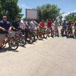 The C&C team enjoys a bike ride from the brewery into downtown. Matt Bronson, CT and RI Market Manager, New Belgium; Eric Queenan, Sales Rep., C&C; Christopher Correia, Sales Rep., C&C: Joe Sincerny, Field Marketing Manager, C&C; Keith Morris, On Premise Sales Manager, C&C; Anthony Micheletti, Sales Rep., C&C; Justin Kelley, Sales Rep., C&C; Craig Lancaster, Sales Rep., C&C; Scott Dulieu, Sales Supervisor, C&C; Many Cruz, Sales Rep., C&C; and Greg Holmes, CT/NY/RI Regional Manager, New Belgium.