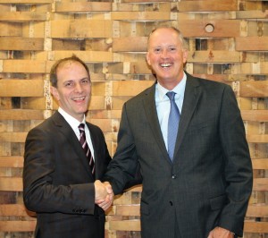 Former CDI President Brian Albenze welcoming incoming President John Parke.