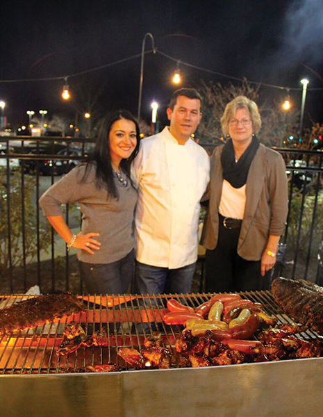 Owners Mira Puka and Chef Dorjan Puka celebrating with Mindy Rosenberg from Hartley & Parker, Ltd.