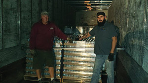 The delivery truck driver with Baxter Brewing Company’s Warehouse Manager, Adam Dube.
