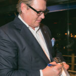 Nolet signed bottles for guests.