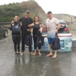 Cleaning up Second Beach with Clean Ocean Access. Jackie Connetti, Innovation and Market Manager RI, Edrington Americas; Jason Kindness, Manager, The Revolving Door; Kayleigh Speck, Brand Activator, Edrington Americas; and Snow Leopard Vodka Founder Stephen Sparrow.