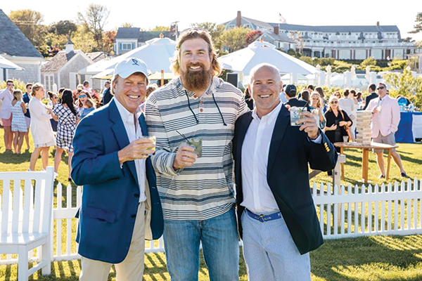 Owners Bill Dessel, Matt Light and Tom McGowan at a summer event at Chatham Bars Inn.