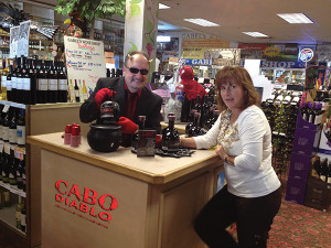 Shown with Bob Bowe (in horns) is Gina Semmonella, owner of Gabel’s.