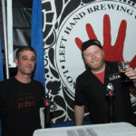 Craft Beer Guild of RI’s Eric Schwartz, Sales Rep., and Shaun Daniels, Sales Supervisor, pouring for Colorado’s Left Hand Brewing Company. Rhode Island Brew Fest 2016.