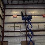 CDI’s Joe Palisi taking the aerial shot in the new warehouse.