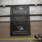 A banner welcomed ribbon-cutting ceremony guests.