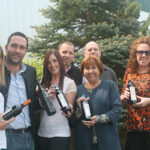 Baracchi poses with members of the Cellar Fine Wines staff outside their Essex warehouse. Left to right: Whitney Mitchell Algieri, New Haven Sales Rep., Cellar Fine Wines; Baracchi; Jenna Talbot, Hartford Sales Rep., Cellar Fine Wines; Rich Veilleux, Sales Manager, Cellar Fine Wines; Janeen Carabetta, Managing Partner; John Stapienski, Middlesex and New London Sales Rep., Cellar Fine Wines; Jacey Haskell, Fairfield Sales Rep., Cellar Fine Wines.