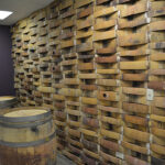 Repurposed wine barrels are incorporated into design decor.