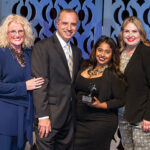 Dale Venturini, RIHA President and CEO; Incoming 2016 RIHA Chairman Bahjat Shariff; Monika Zuluaga, RIHA Manager of Member Services & Communications, RI Hospitality Association with her Emerging Leaders Under 30 Award; Heather Singleton, RIHA Chief Operating Officer.