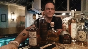 Anthony DeSerio, guest columnist, with the spirits used in the accompanying fall cocktail recipes.