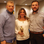 All of Eder Bros., Inc.: Jason Miller, Brown-Forman Wine Portfolio Winner; Nancy Peduto, Brown-Forman On-Premise Representative of the Year, holding a 2016 Golden Jack statuette; and Vin Rossetti, Brown-Forman Tequila Portfolio Winner.