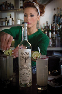 Mia Sarazen, portfolio ambassador from Back Bar Project, demonstrates use of the mezcals making two of her creations, “Smoke and Flowers" and "Titsi on the Fly." Photo by Chris Almeida.