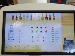 Interactive touchscreens enhance the shopping experience.