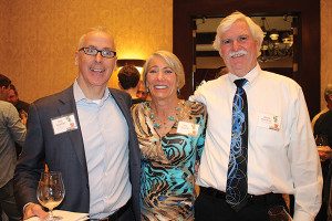 Ken Mancini, Owner, C & C Distributing, a division of Rhode Island Distributing Co.; Rita Martin, Marketing Manager and event organizer of the trade show, Rhode Island Distributing Co. with husband Shawn Martin.