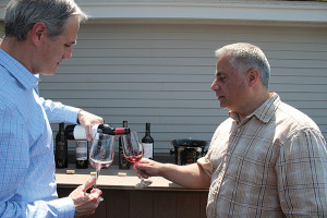 Philip Garrison, Northeast Regional Manager, San Francisco Wine Merchant with James Rivera, Manager, Manchester Wine and Liquors.