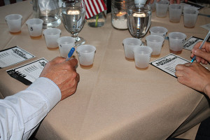 Guests casting their votes for favorite bourbon.