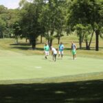 A foursome of golfers.