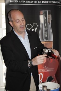 David Eber, President, Santa Maria Imports, pouring a spirit sample.