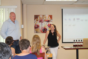 John Slocum, Executive Vice President and General Manager, Slocum & Sons introducing Mimi Buttenheim, President, Mad River Distillers.