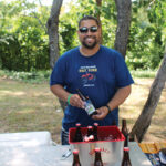 Ariel Novo of Northeast Beverage pouring samples of New Belgium Beer.