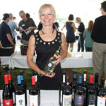 Lori Tunmer, Representative, Vine Ventures, pouring Palm Bay International Selections.