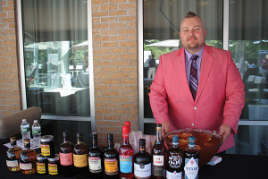 Roger Gross, United States Bartenders Guild Connecticut (USBG CT) chapter member, serving cocktails featuring Anchor Distilling Company spirits.