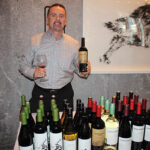 Matthew Shakespeare, Area Wine Manager CT/MA/ME/RI/VT, Don Sebastiani & Sons, holding Gunsight Rock Cabernet Sauvignon.