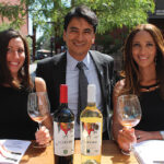 Megan Haas, Vine Ventures; Alejandro Flores, Owner, RedPuro Wines; Jade Morvan, Vine Ventures, beside RedPuro Fair Trade Chardonnay and RedPuro Organic Malbec. RedPuro Wines are importers of organic, sustainable and fair trade wines.