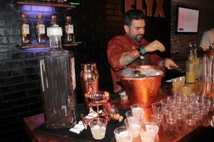 United States Bartenders Guild Connecticut (USBG CT) chapter President Dimitrios Zahariadis mixing cocktails featuring Absolut Elyx.