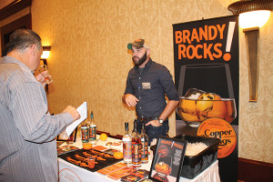 Christopher Wilkins of Copper and Kings American Brandy speaking with guests.