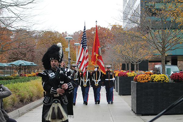 The U.S. Marine Corps Honor Guard led a presentation of the colors escorted by The Hampton Pipes and Drums.