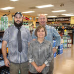 Christian Iezzi beside Terri Audet and Jim Iezzi.