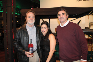 Rob Vickers, Co-Owner, Vickers’ Liquors; Elizabeth Moniz, Employee, Vickers’ Liquors; Mike Paradis, Store Manager, Vickers’ Liquors showcasing their Sons of Liberty Single Barrel Bourbon made for Vickers’ Liquors.