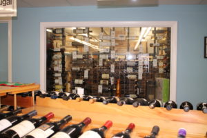 A view into the temperature controlled wine room at Dick's World of Wines.