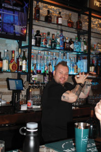 Roger Gross, Bartender, House of Naan and USBG CT member, mixing cocktails for the event.