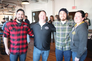 All of Two Roads Brewing Company: Jamie Proulx, Dan Zeek, Jared Emerling and Caitlin Guelakis.