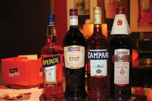 Aperol, Cinzano 1757, Campari, Campari Negroni on display.