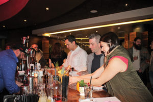 The three judges, Justin Zylick, Vice President of Sales, Diageo; Adam Patrick, USBG CT President; and April Wachtel, Founder/CEO, Swig + Swallow, reviewing the cocktails during the event.