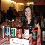 Christa Asselin pouring selections from Waypoint Spirits, based in Bloomfield.