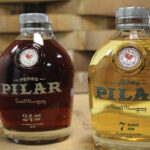Papa Pilar Dark and Blonde Rum. The spirit is aged and blended in a unique process using American oak bourbon barrels, port wine casks (dark only), and Spanish sherry casks.