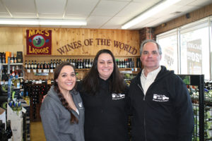 Lauren Guida, Employee; Michelle Sousa, Store Manager, and Robert Guida, Owner.