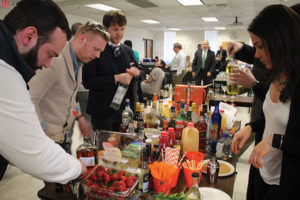 Zone teams creating cocktails, which were judged on name, ease of build, appearance and taste.