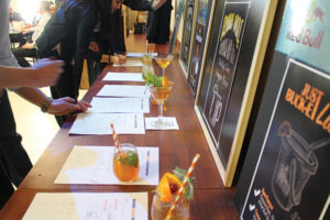 The event judges reviewing the cocktails.