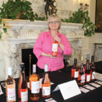 Lynda Ross pouring selections from Winesellers Ltd. in the rosé room.