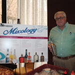 Steve Curt, Sales Representative, Oceanstate Wine and Spirits mixing up cocktails during the tasting.