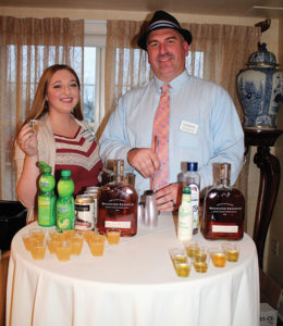 Nicollett Burns and Craft Spirit Specialist Jeff Conelius of Allan S. Goodman featuring Woodford Reserve in cocktail samples.