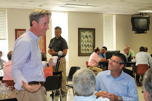 Doug Bowie answering questions from Brescome Barton sales staff. John Taylor is in the background.