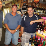 Steven, Denis and Jason Deschamps of Champs Discount Liquors.